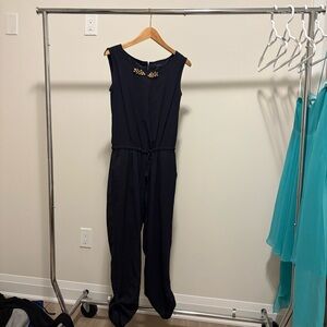 Elegant Black Jumpsuit with Embellished Neckline